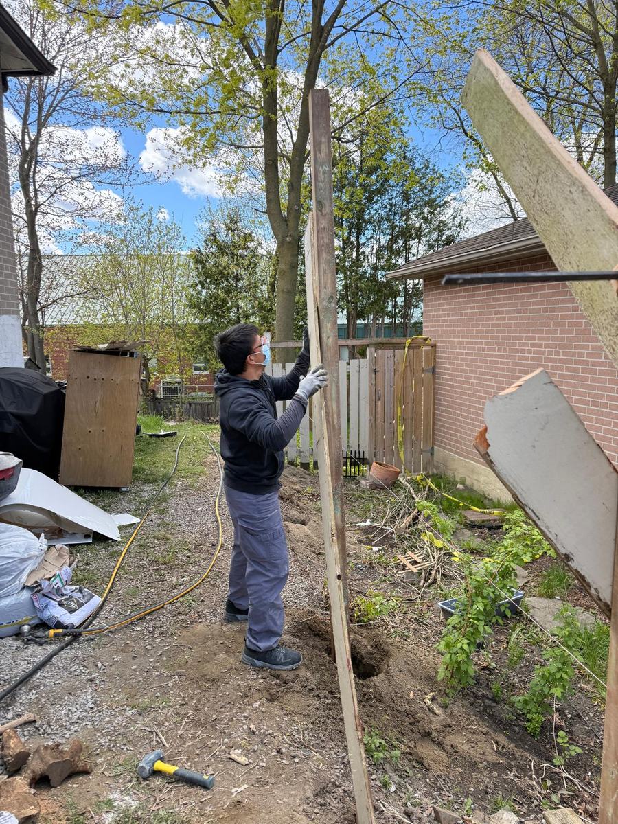 A Kohan R&R crew member working on an exterior job