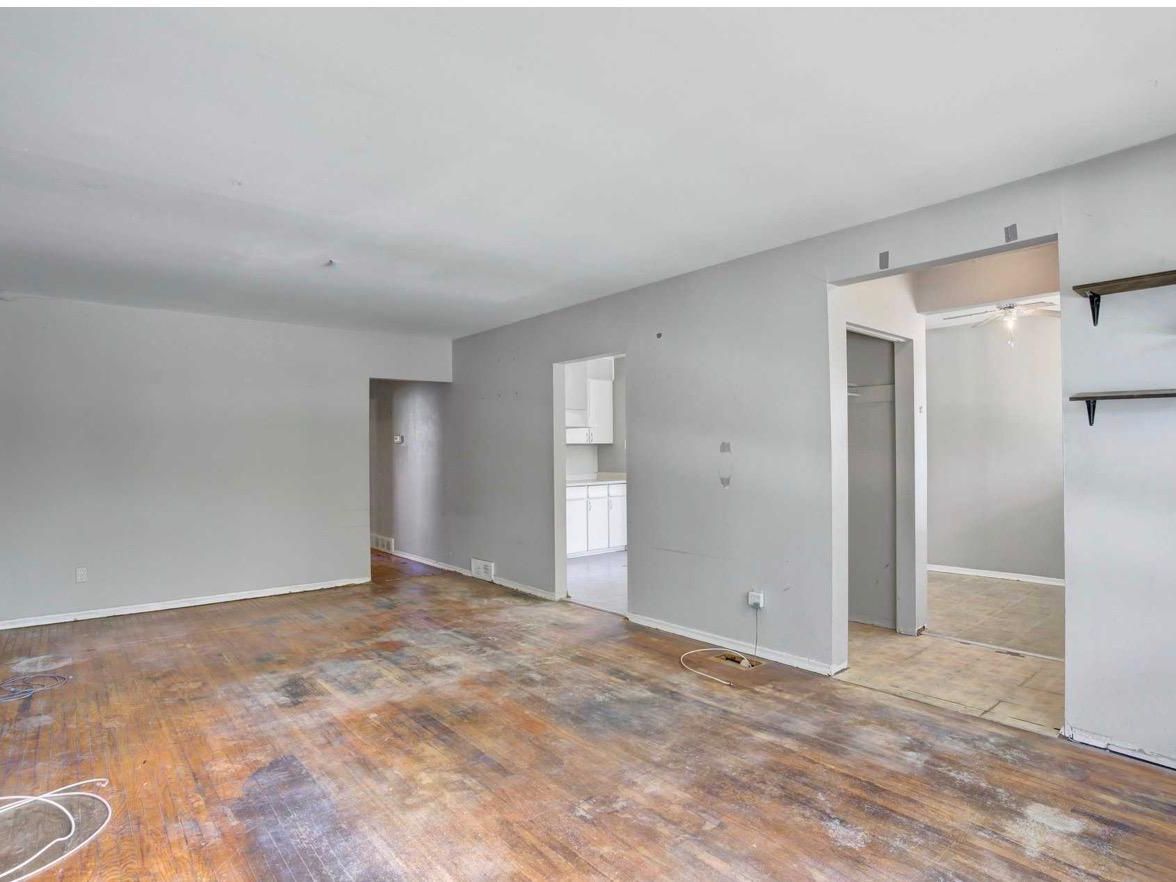 The same basement after framing, drywall, paint and lighting