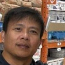 Kim, security camera installer at Kohan R&R, selecting materials at a supplier